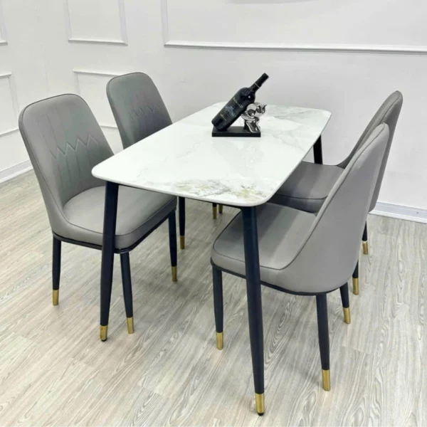 Bàn ăn mặt đá ceramic chân côn