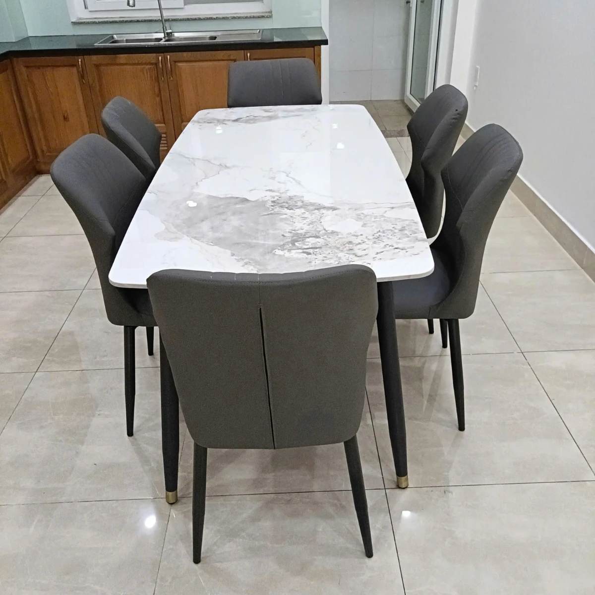 Bàn ăn mặt đá ceramic chân côn 4 ghế Cozy