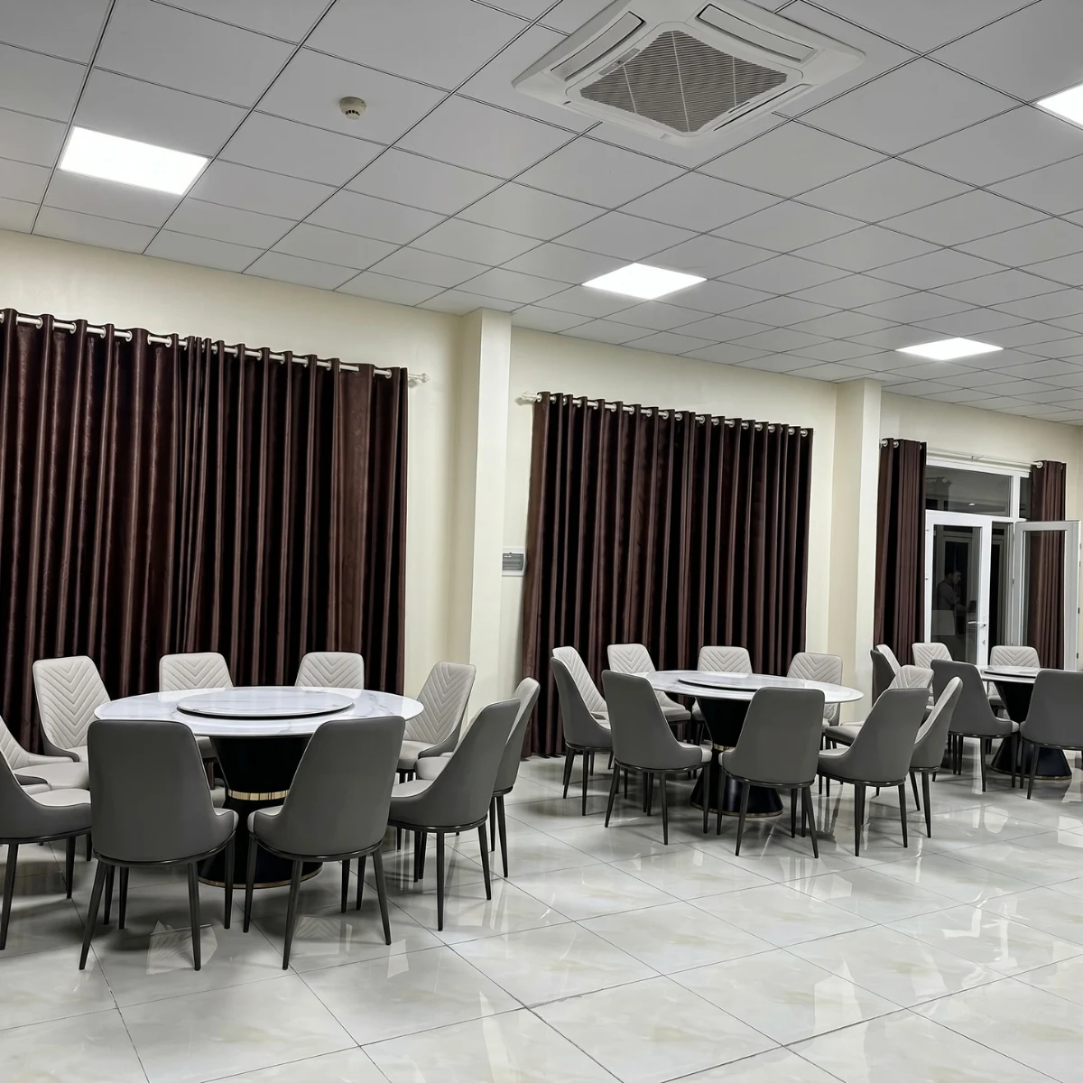 Bàn ăn tròn mâm xoay mặt đá 10 ghế Spine