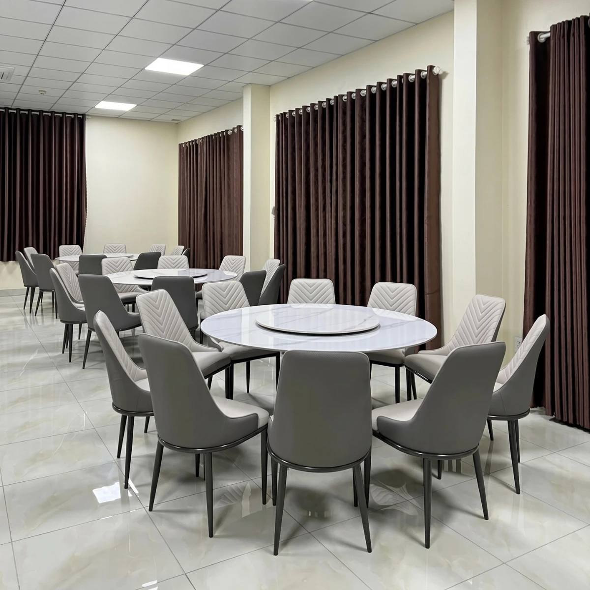 Bàn ăn tròn mâm xoay mặt đá 10 ghế Spine